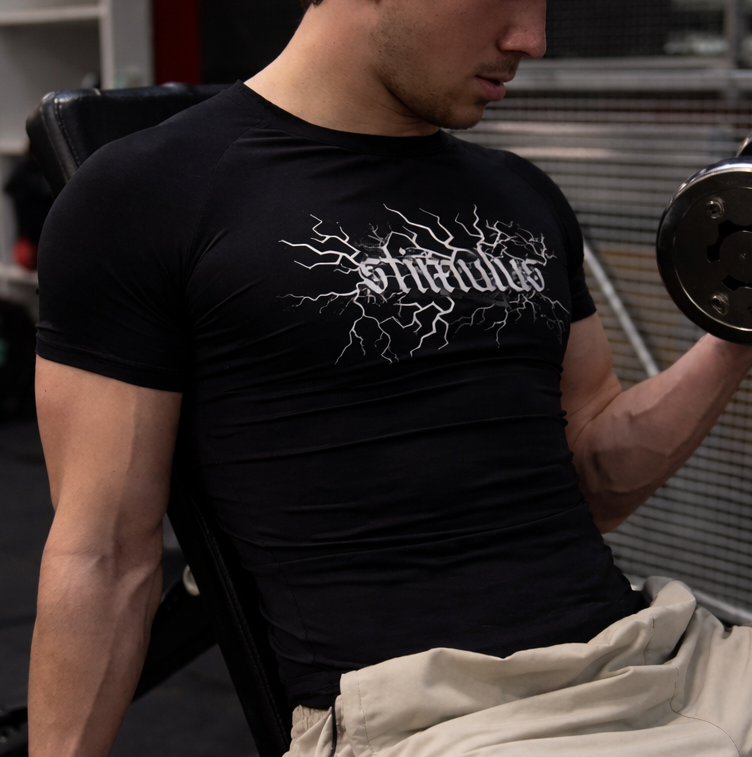 Person lifting weights in a gym setting